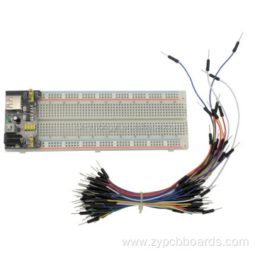 Plastic and metal breadboard and power supply